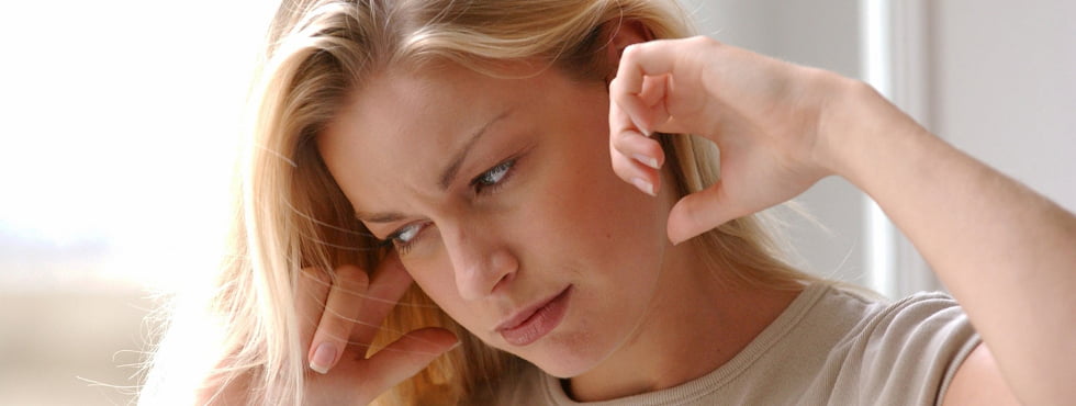 Tinnitus - a ringing, swishing, or other type of noise that seems to originate in the ear or head